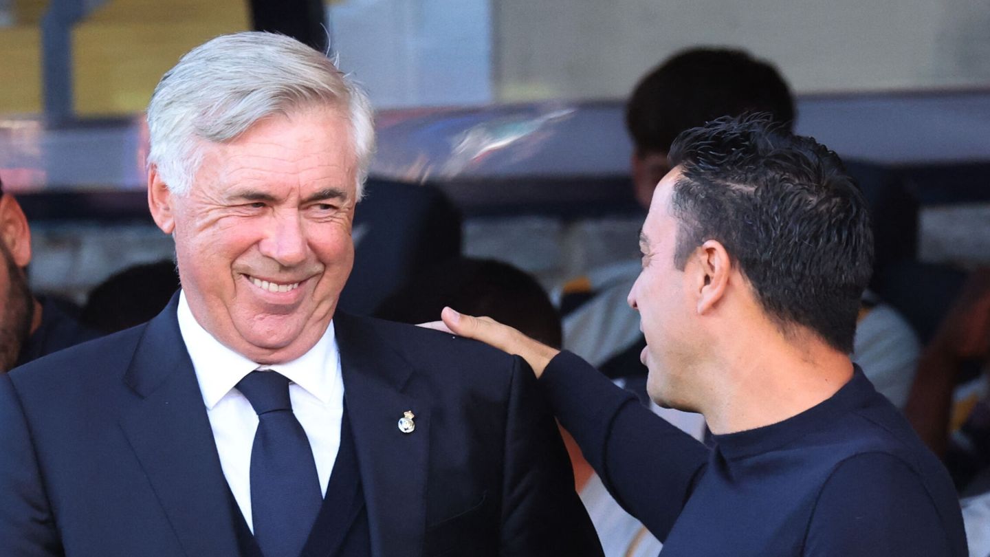 Ancelotti y Xavi se volverán a ver las caras. (Reuters/Nacho Doce)