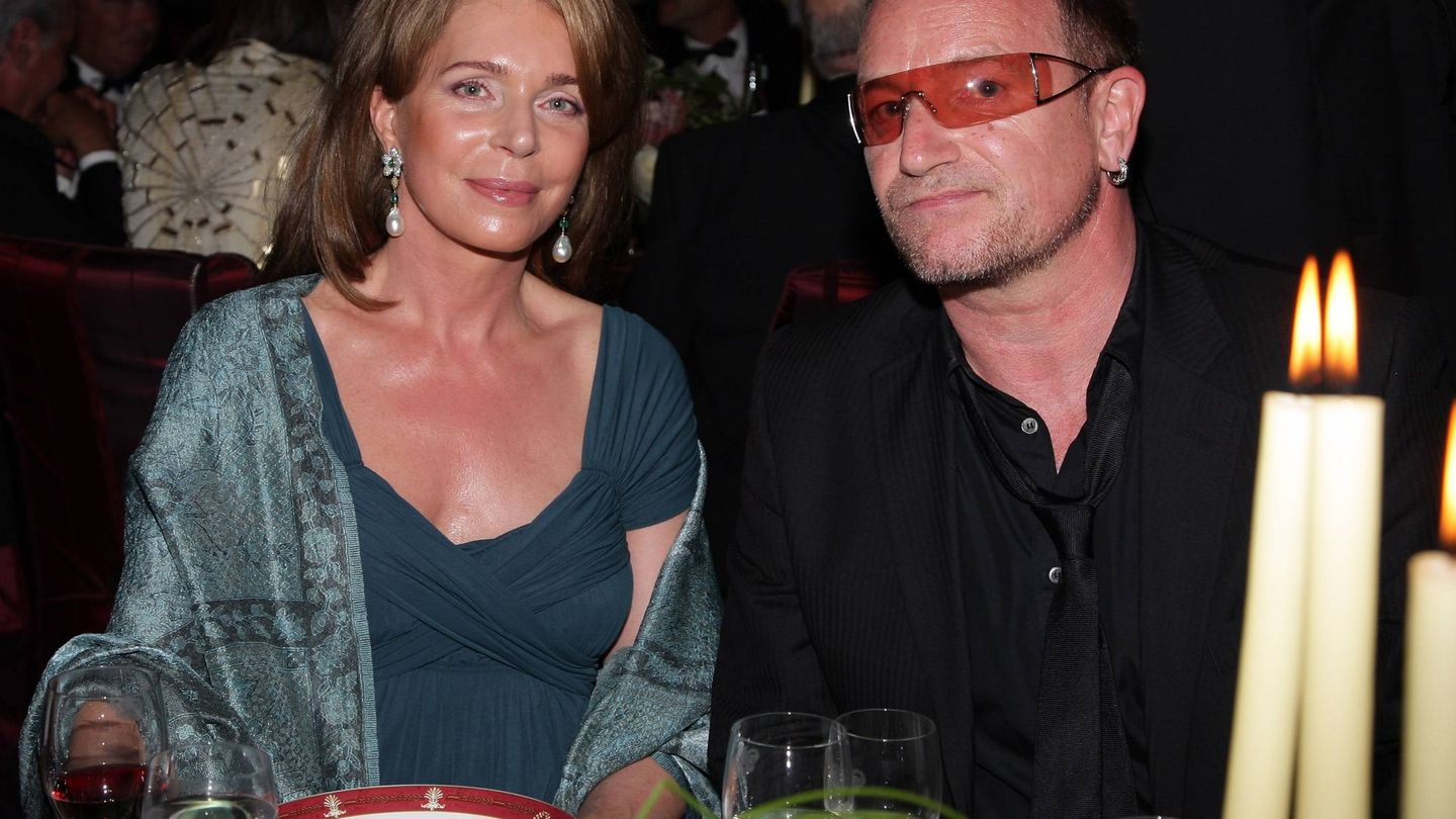 Con Bono, cantante de U2, en una cena benéfica. (Getty)