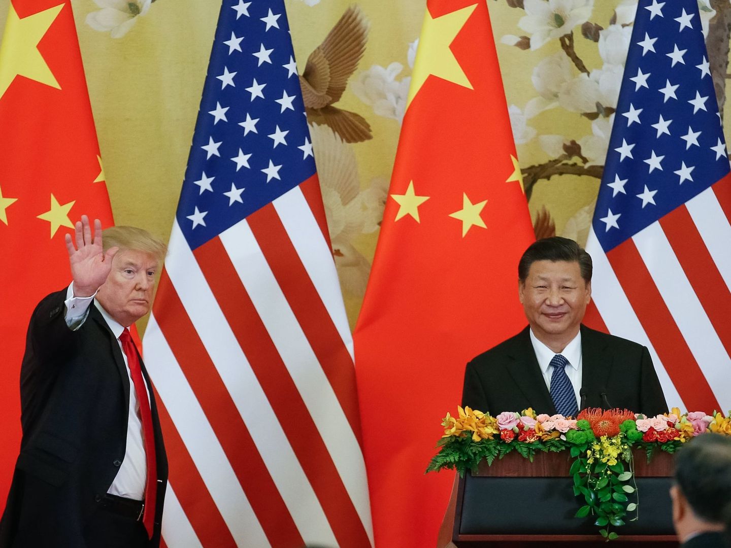 El presidente de los EEUU, Donald Trump (i), y su homólogo chino, Xi Jingping (d). (EFE)