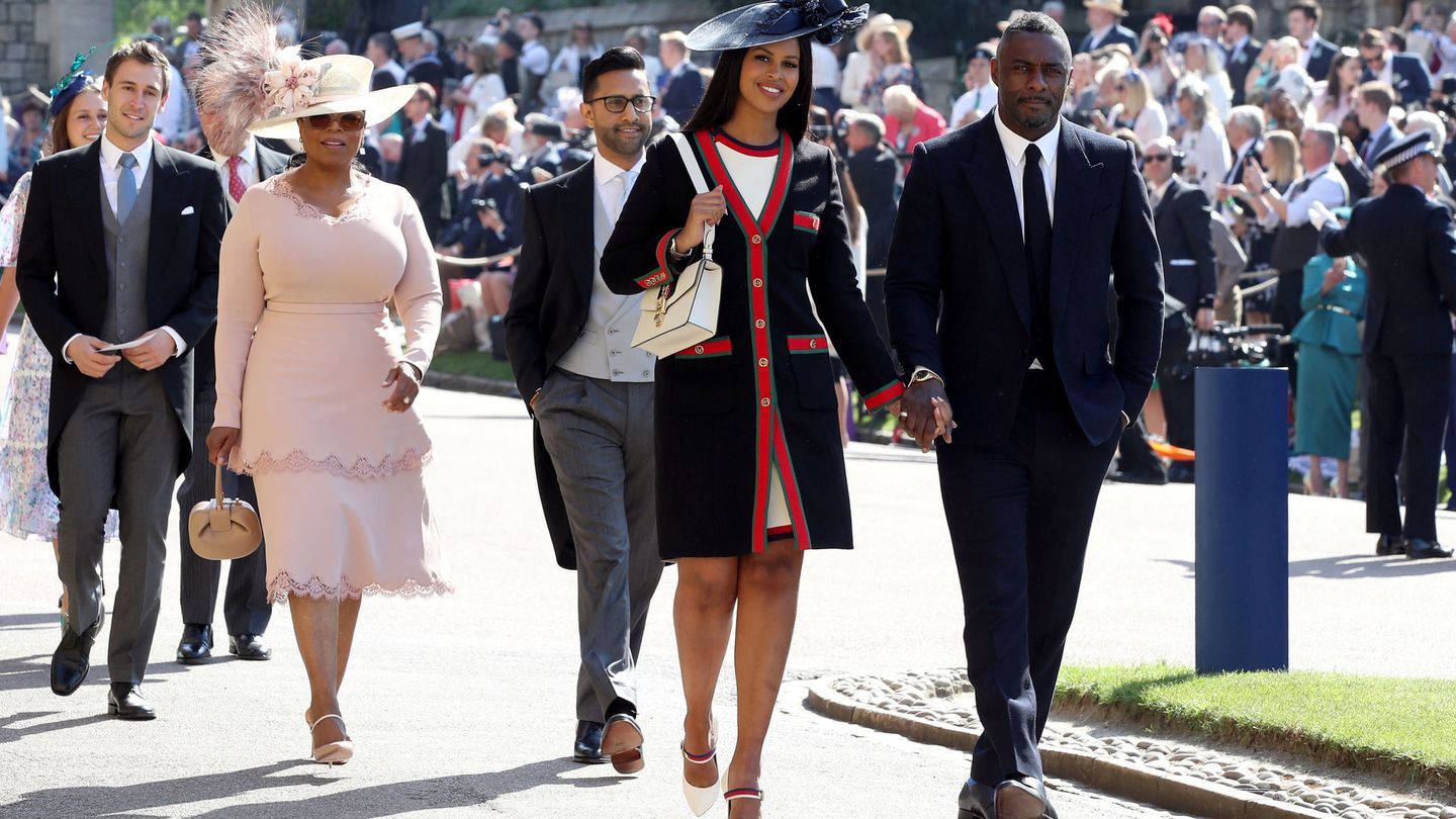 Idris Elba con su pareja y Oprah Winfrey, en la boda de Harry y Meghan. (Reuters)