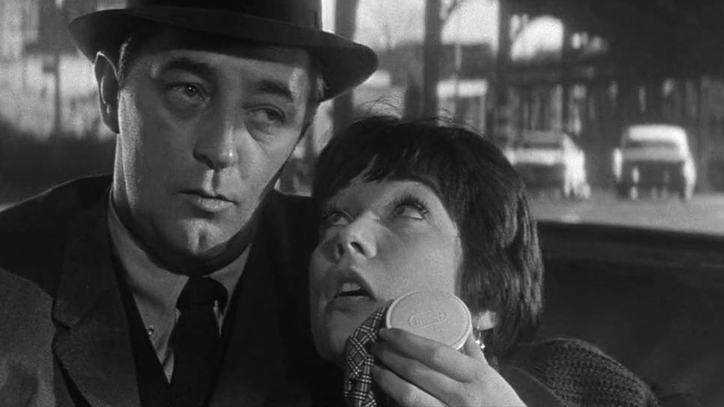 Robert Mitchum y Shirley MacLaine en 'Cualquier día en cualquier esquina'.  (1962)